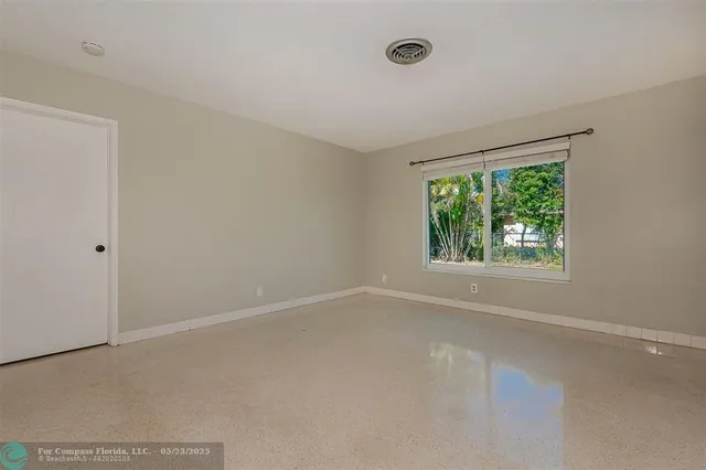 an empty room with a window