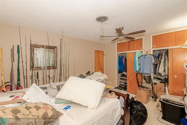 a bed room with a bed and a walk in closet