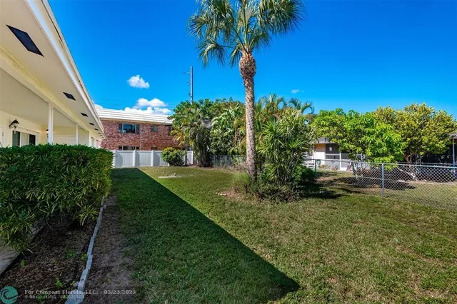 a view of a backyard with a garden