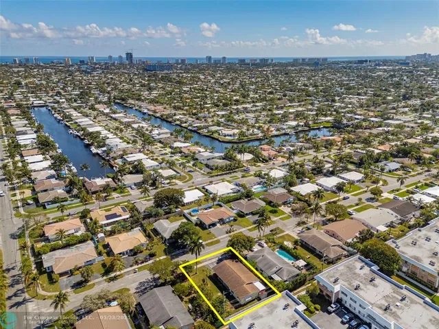 an aerial view of residential building with parking space