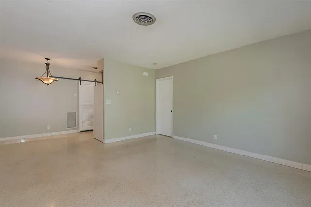 a view of a room with an empty space