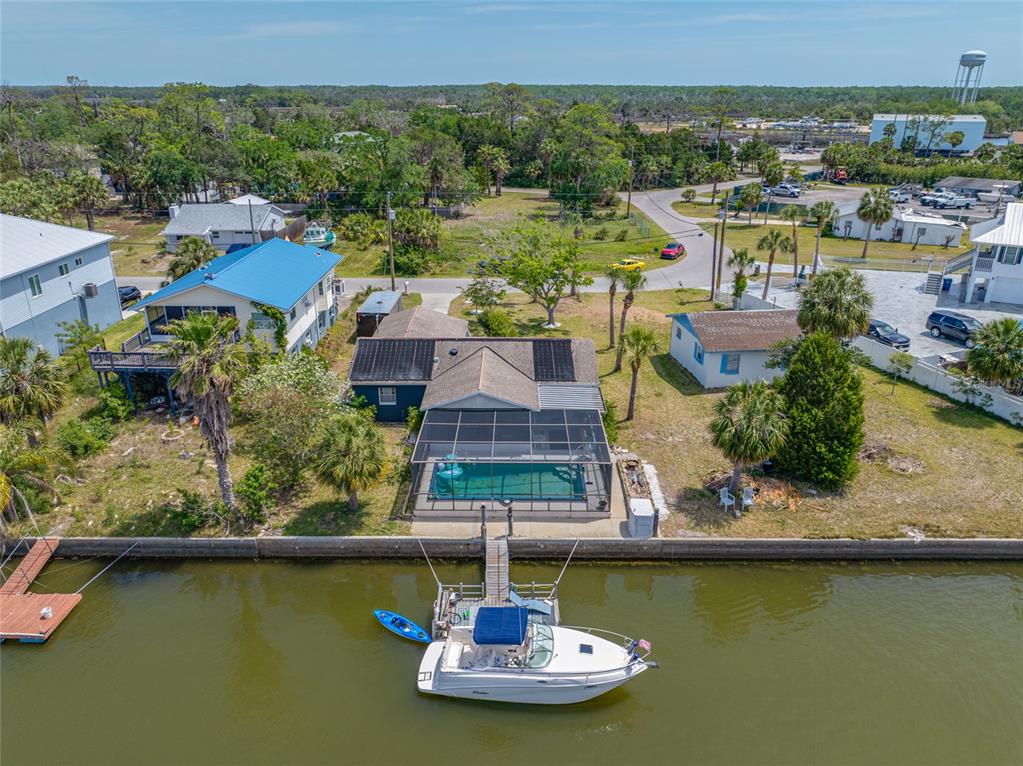 4124 Pine Dale Court Hernando Beach, FL 34607 - Photo 17 of 19 an aerial view of residential houses with outdoor space