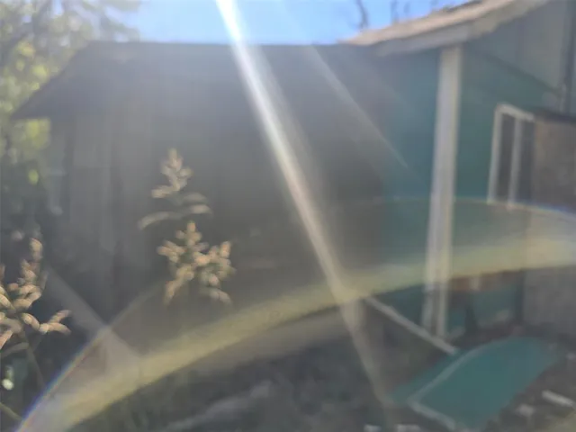 a house view with a outdoor space