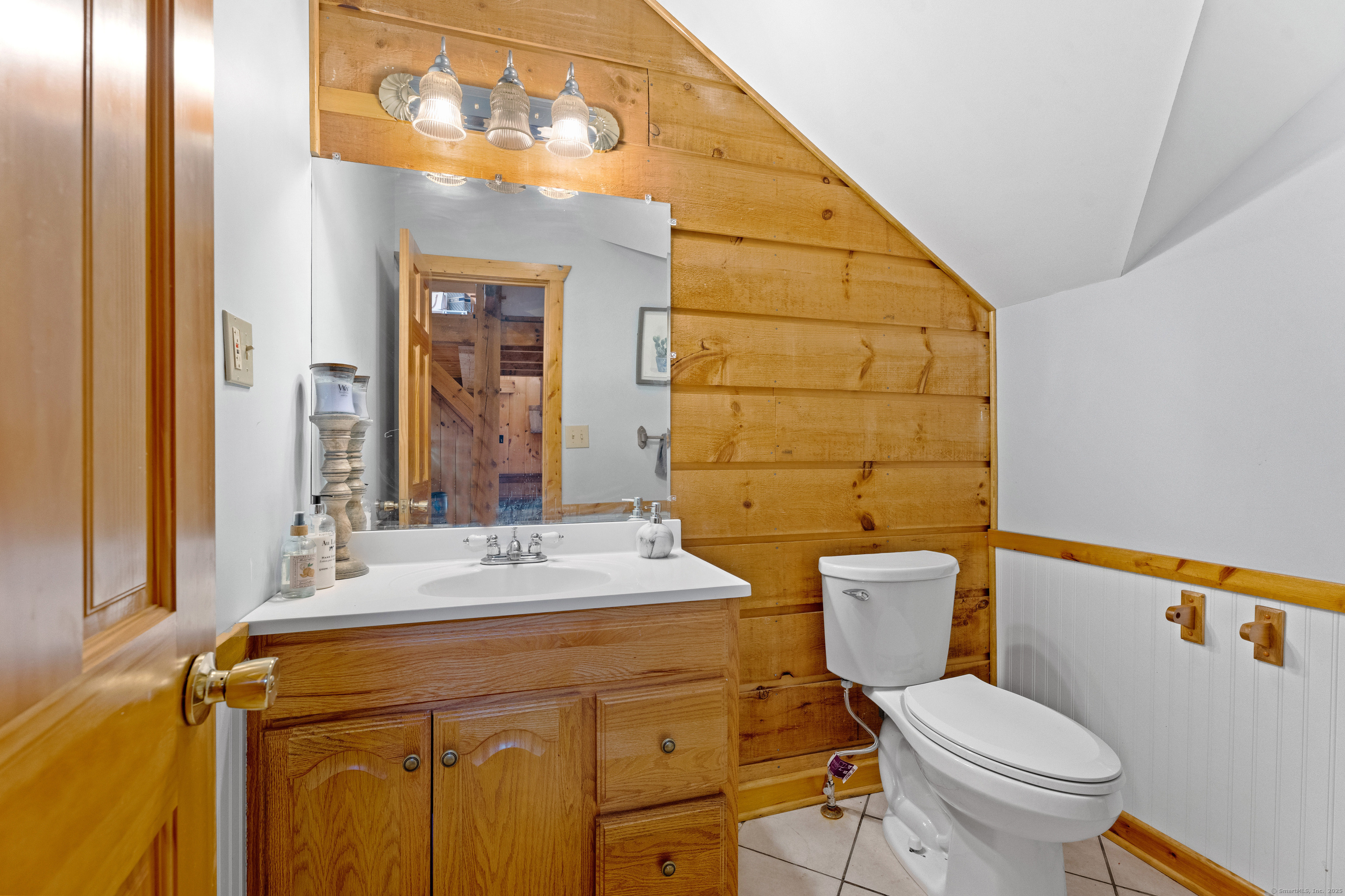 26 Old Wallingford Road Durham, CT 06422 - Photo 15 of 38 a bathroom with a sink a toilet and mirror