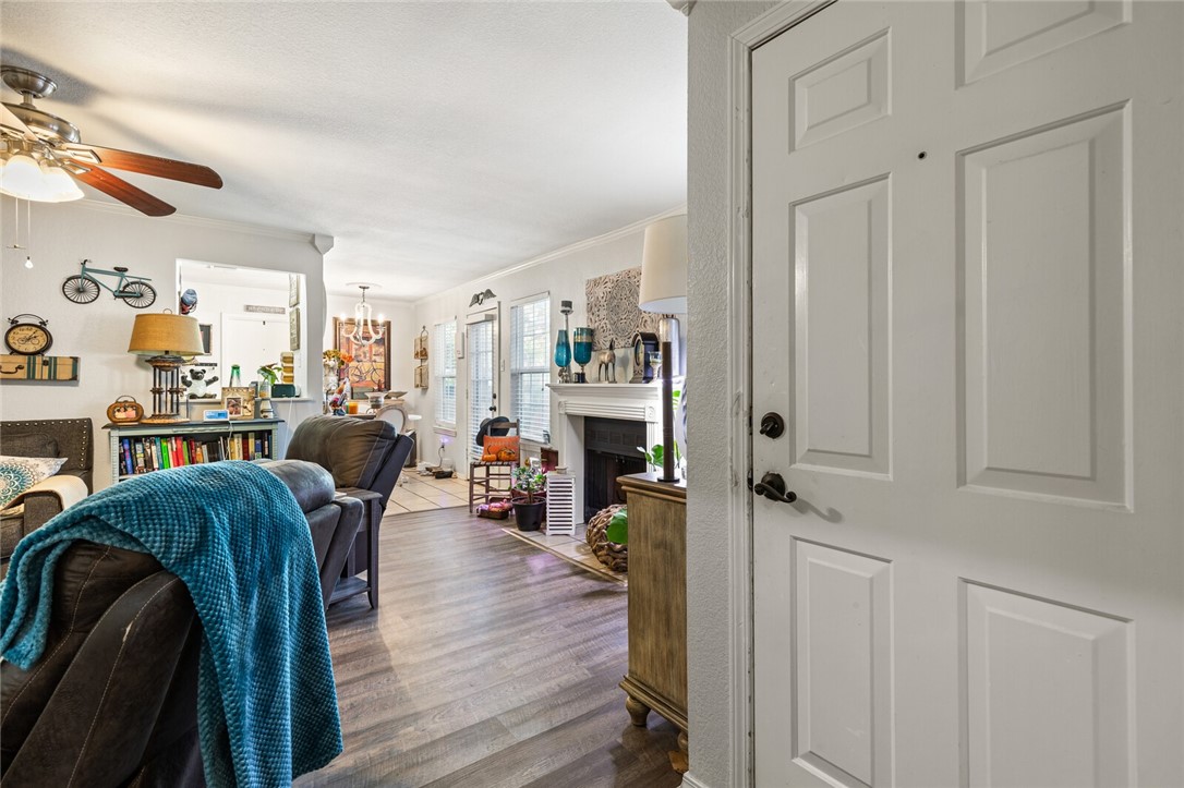 3813 Kimberly Drive, Unit B1 Waco, TX 76708 - Photo 29 of 30 a living room with furniture and a wooden floor