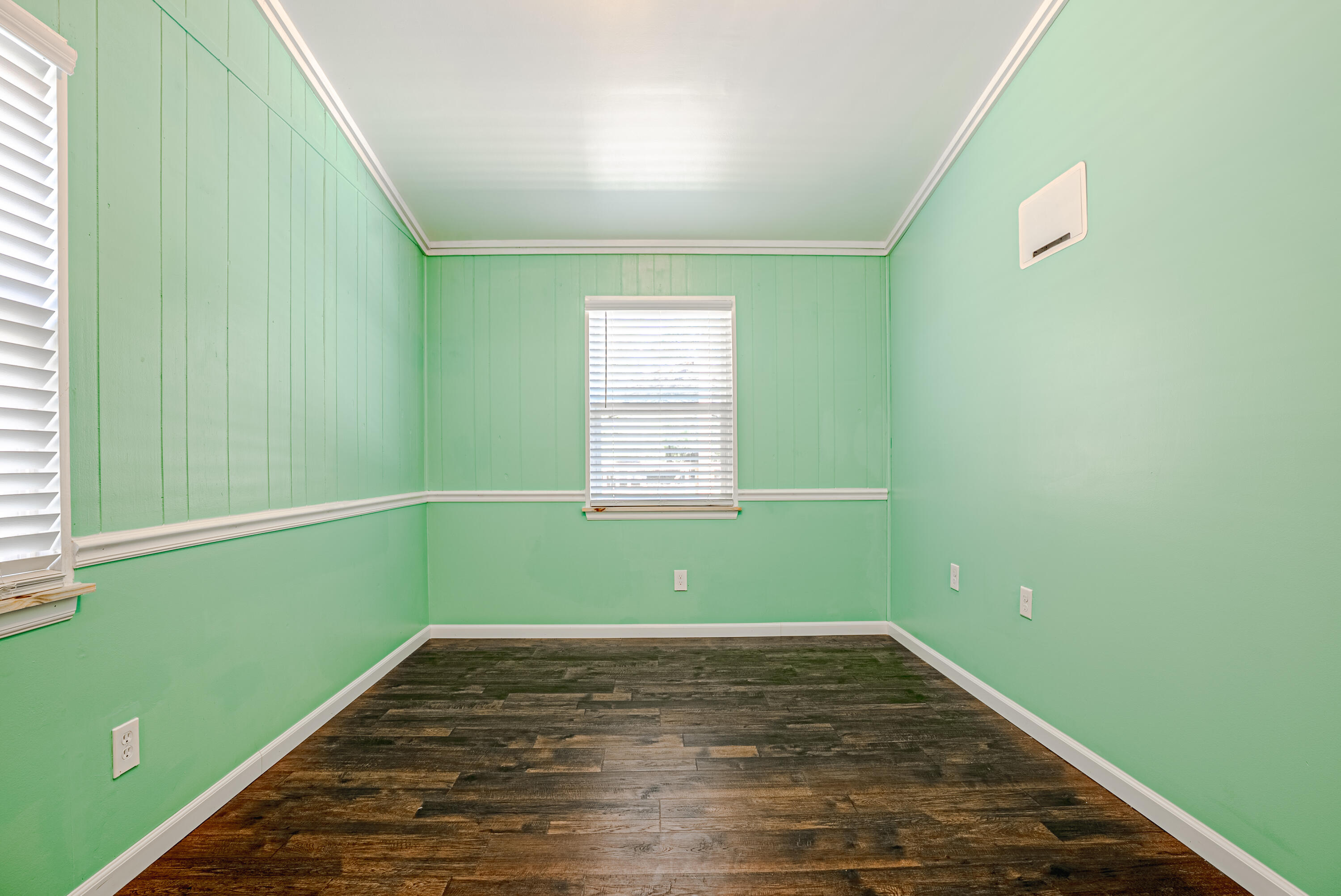 85 Our Street Vernon, FL 32462 - Photo 17 of 66 a view of a room with wooden floor and a window