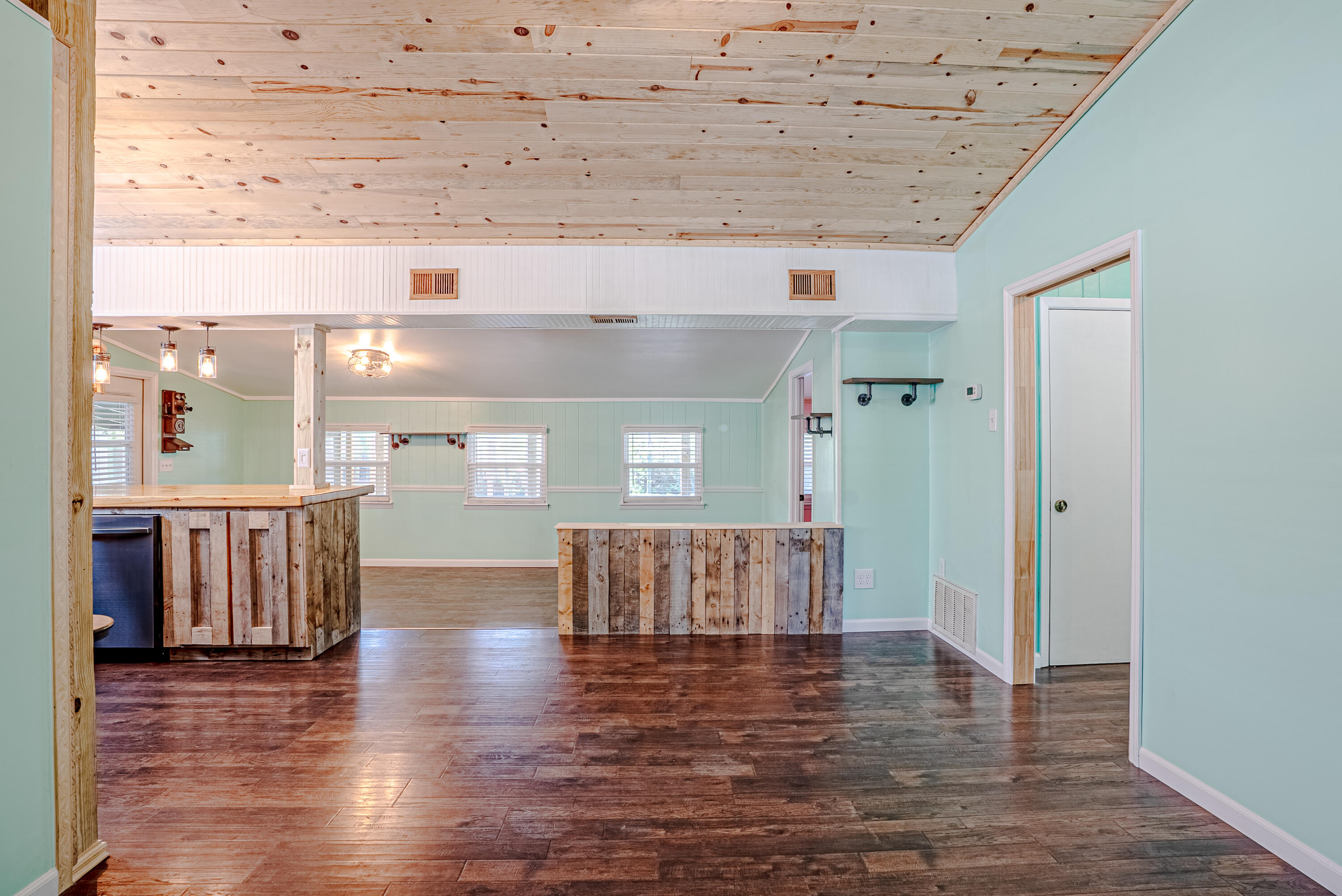 85 Our Street Vernon, FL 32462 - Photo 2 of 66 a view of kitchen with furniture and wooden floor