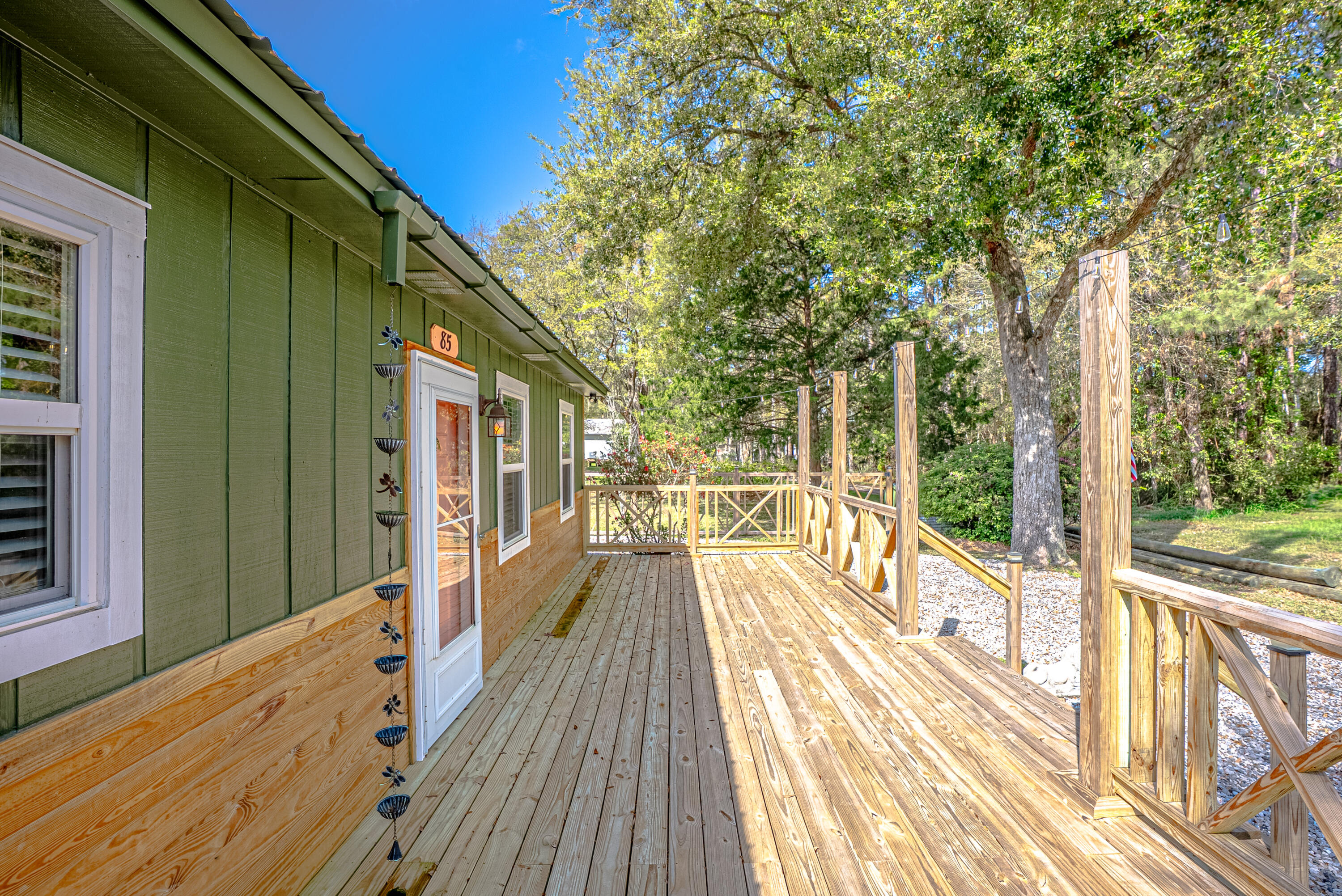85 Our Street Vernon, FL 32462 - Photo 24 of 66 a view of balcony with wooden floor and fence
