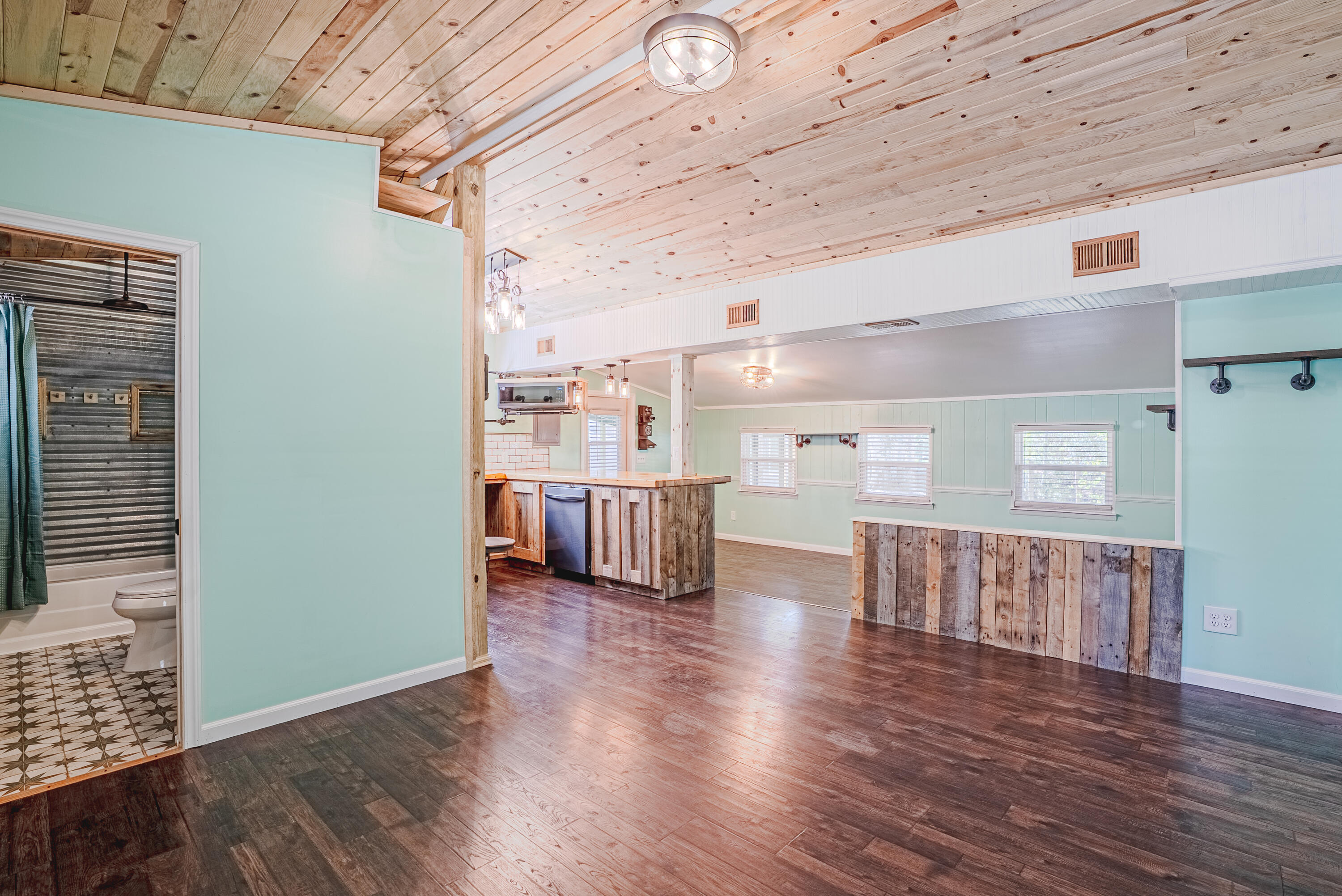 85 Our Street Vernon, FL 32462 - Photo 3 of 66 a view of a room with wooden floor