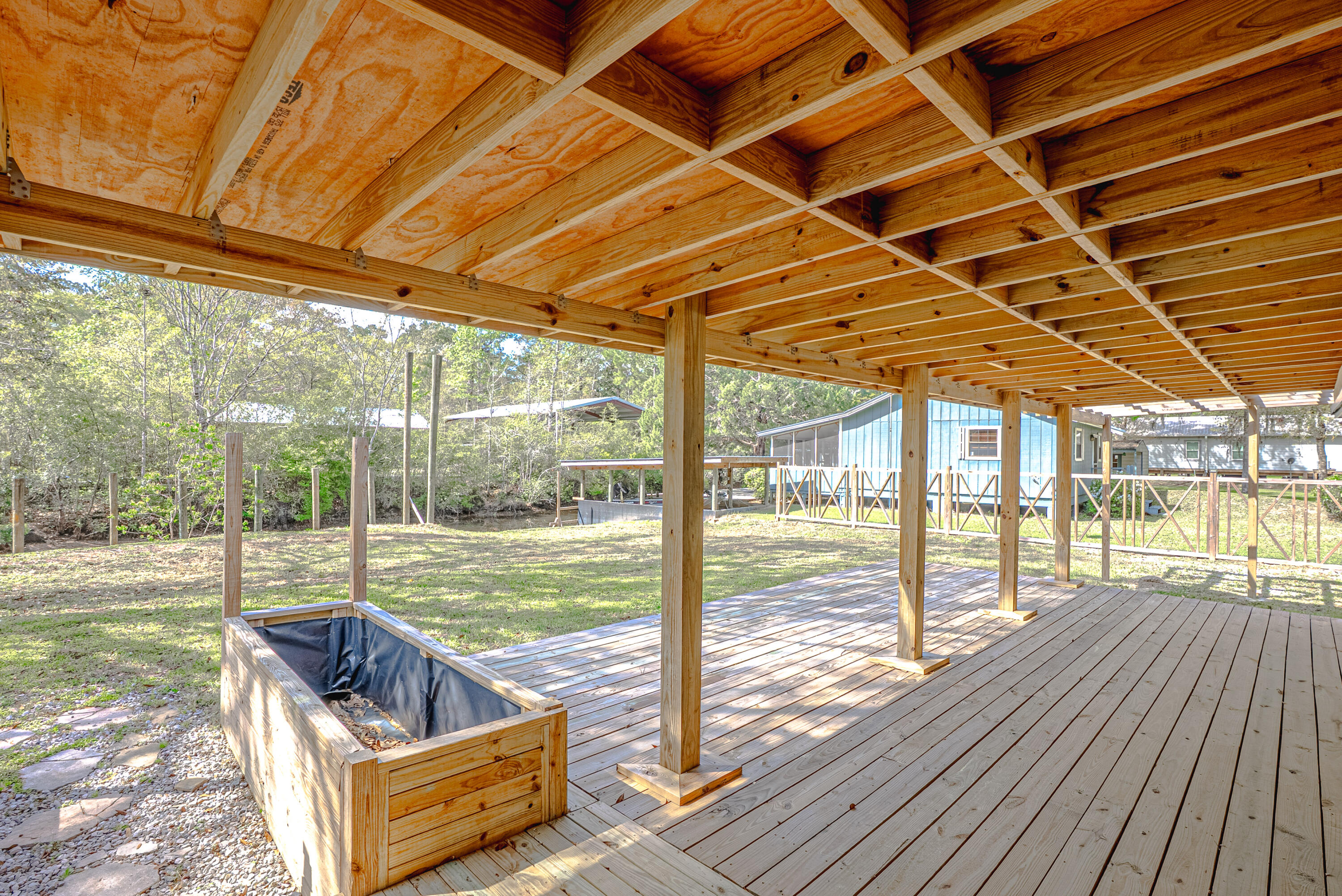 85 Our Street Vernon, FL 32462 - Photo 34 of 66 a view of a swimming pool with a porch