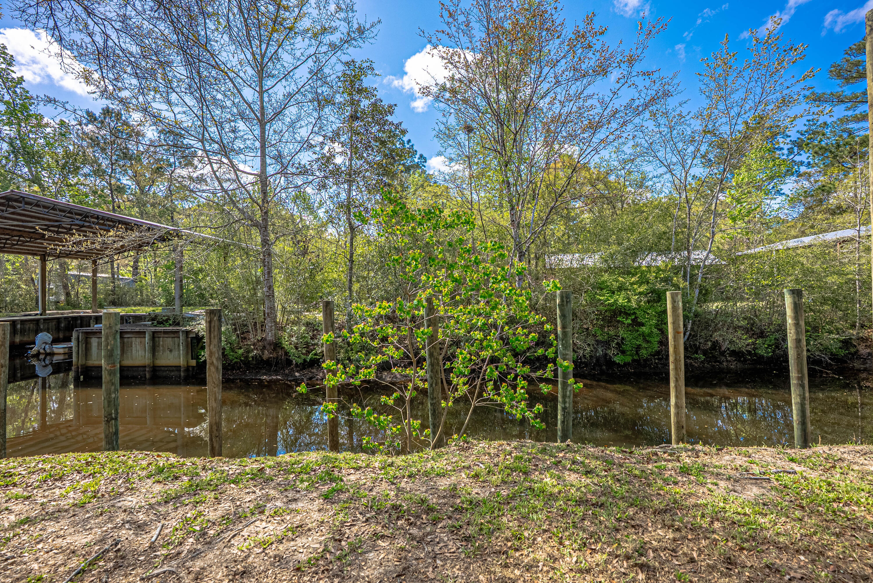 85 Our Street Vernon, FL 32462 - Photo 38 of 66 a backyard of a house with lots of green space