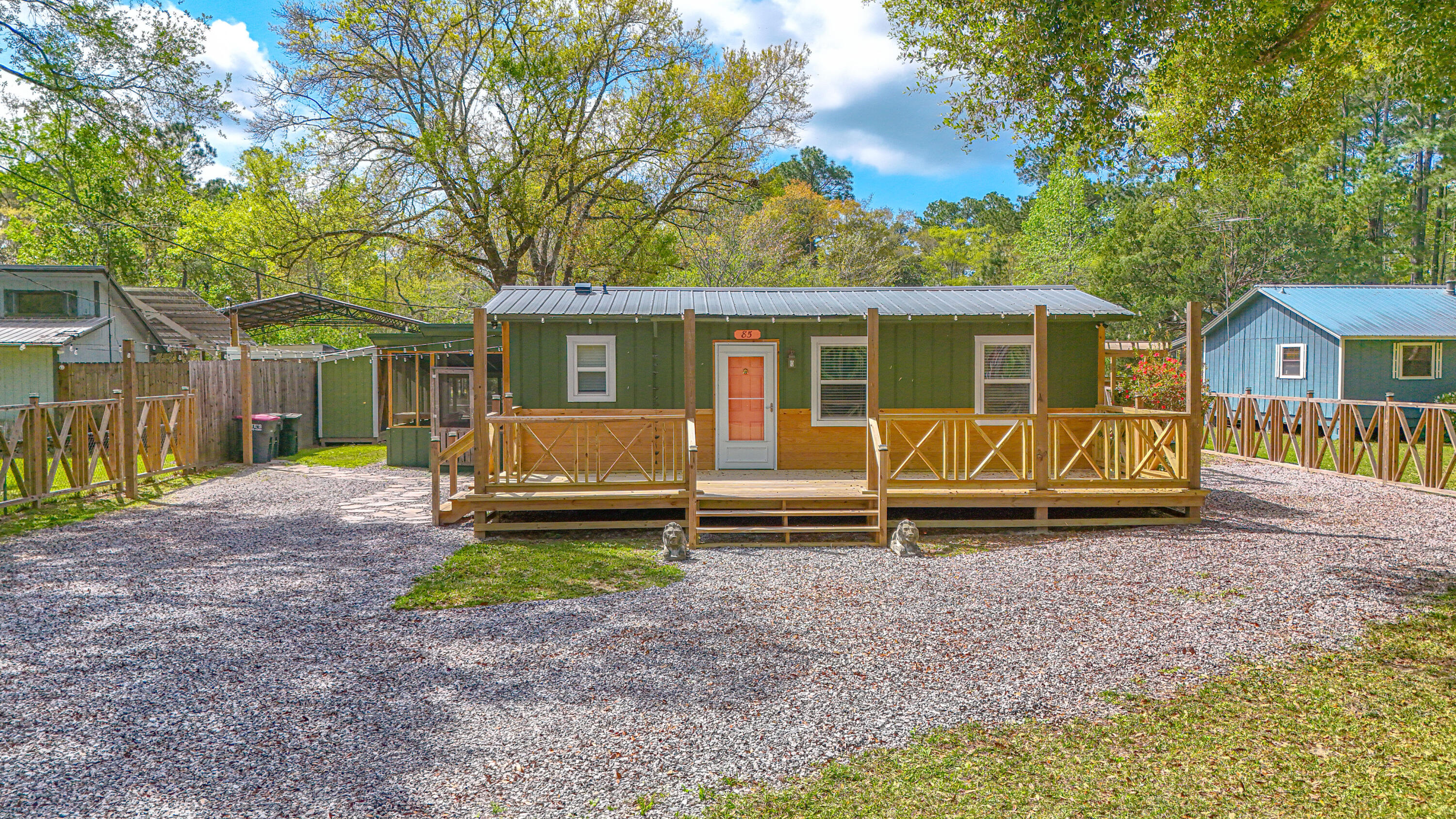 85 Our Street Vernon, FL 32462 - Photo 45 of 66 a house with trees in the background