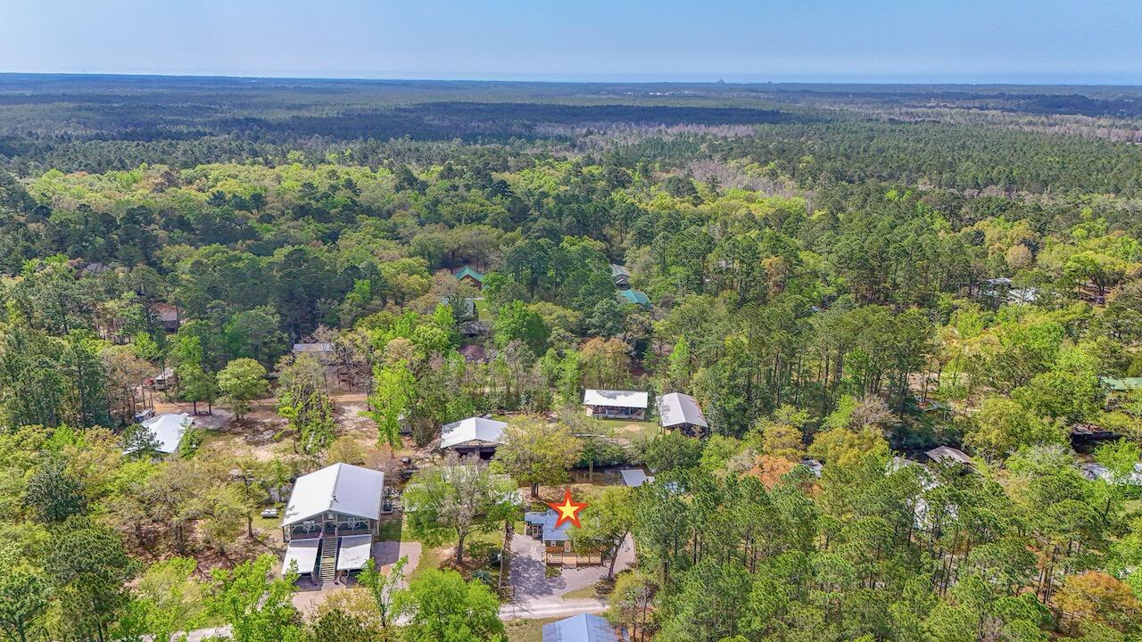 85 Our Street Vernon, FL 32462 - Photo 50 of 66 a view of a city from a yard