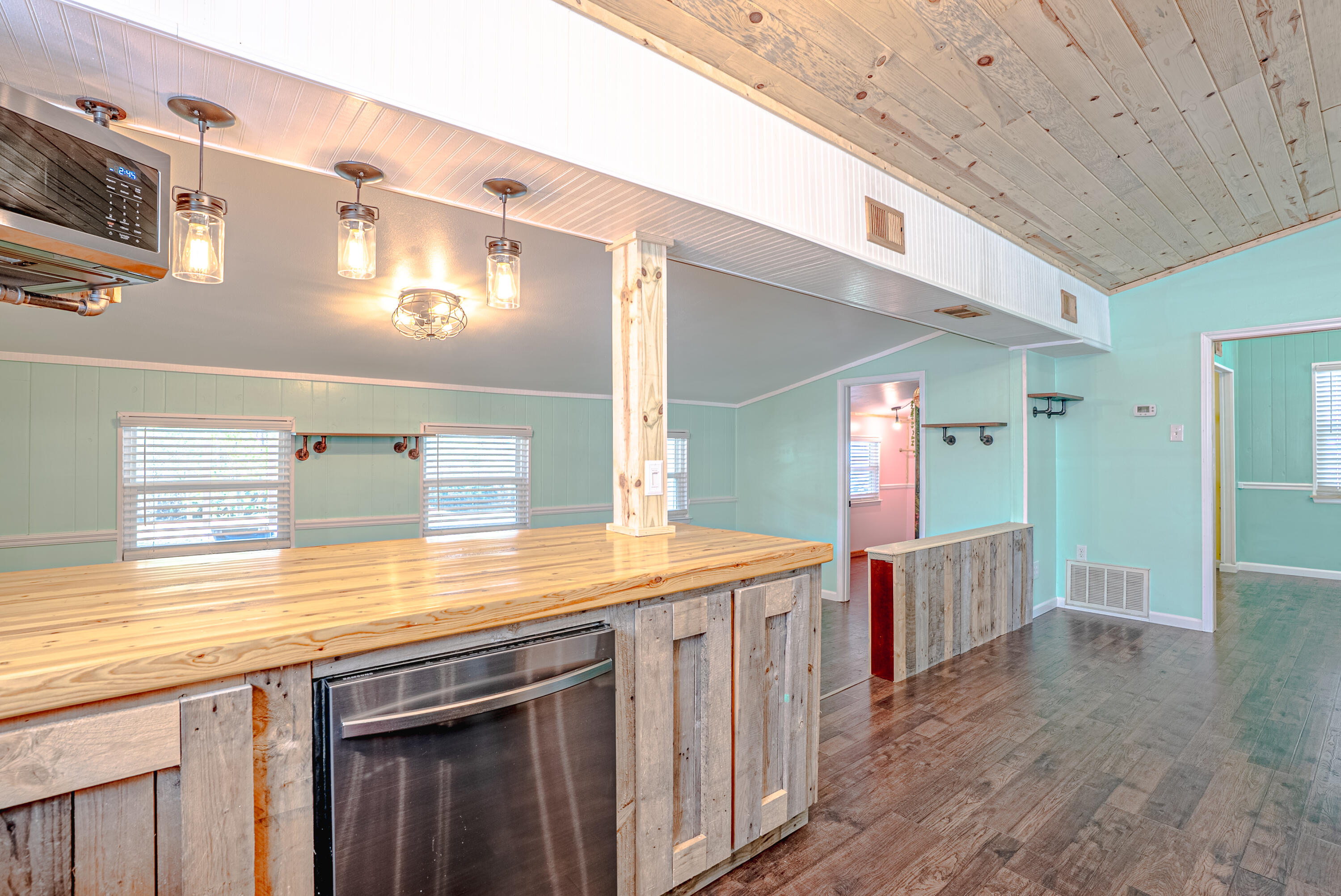 85 Our Street Vernon, FL 32462 - Photo 9 of 66 a view of a kitchen from a hallway