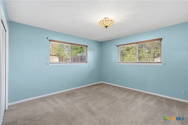 a bathroom with a tub a sink and a shower