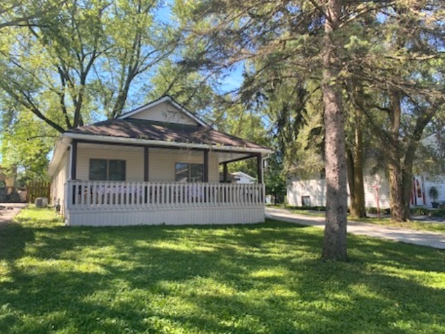 114 Deerpath Road Lake In The Hills, IL 60156 - Photo 1 of 15 a view of a house with a yard and a garden
