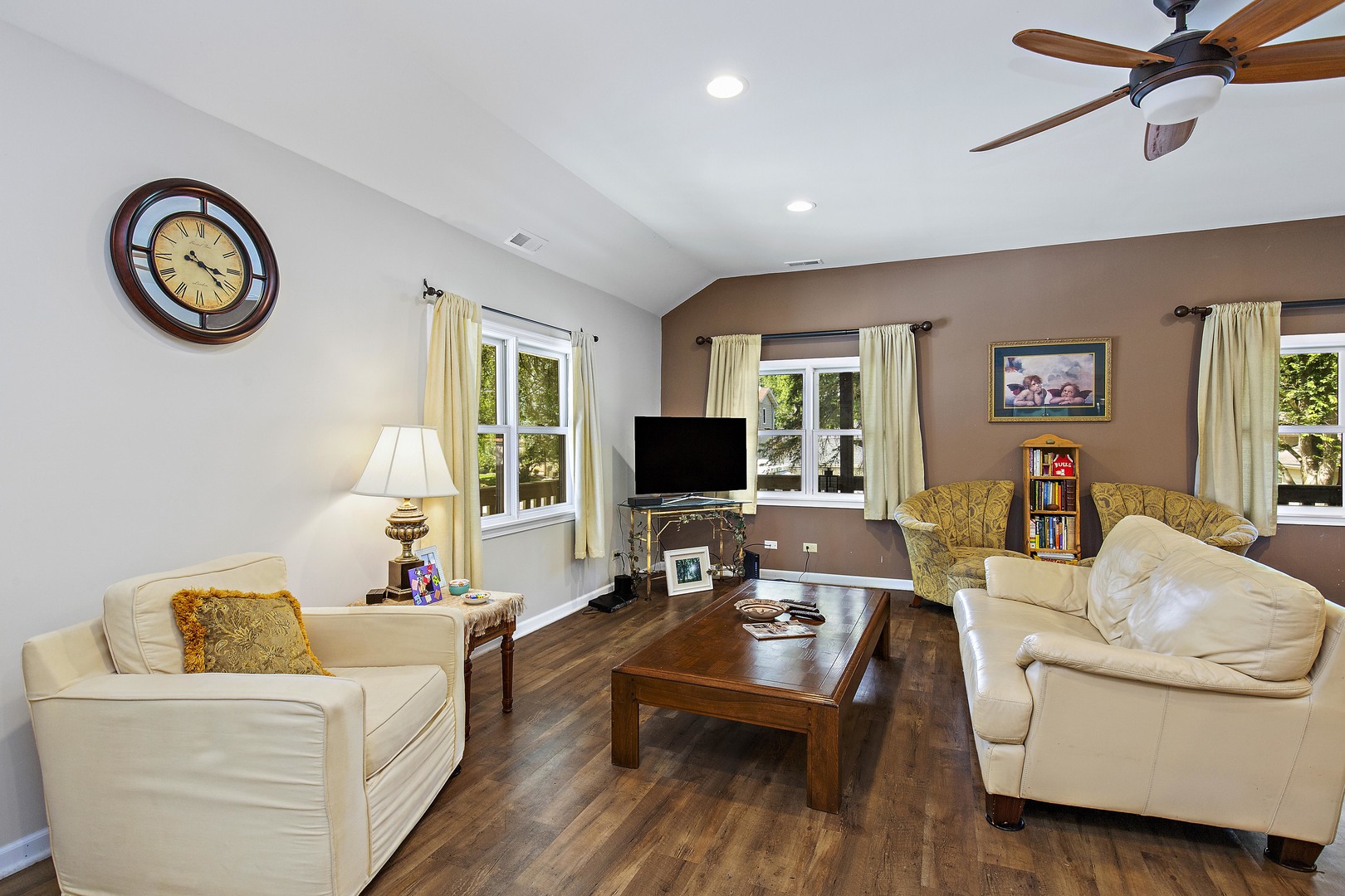 114 Deerpath Road Lake In The Hills, IL 60156 - Photo 6 of 15 a living room with furniture and a flat screen tv