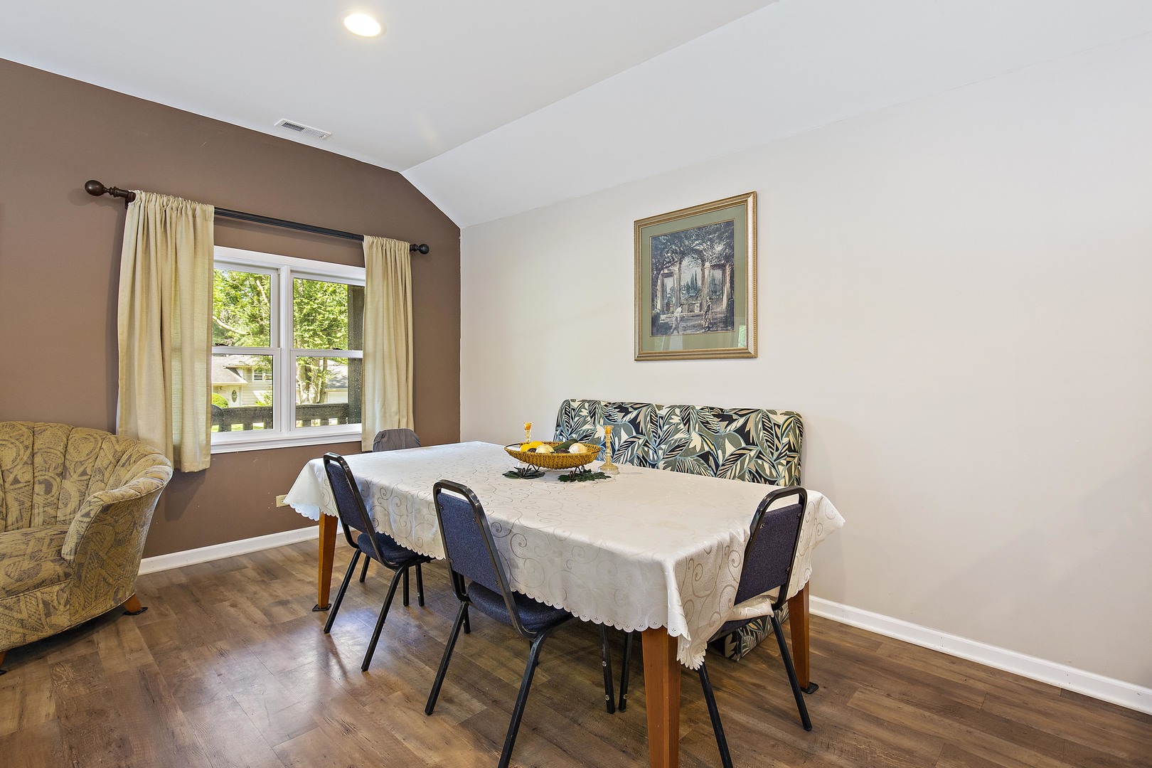 114 Deerpath Road Lake In The Hills, IL 60156 - Photo 9 of 15 a view of a dining room with furniture window and wooden floor