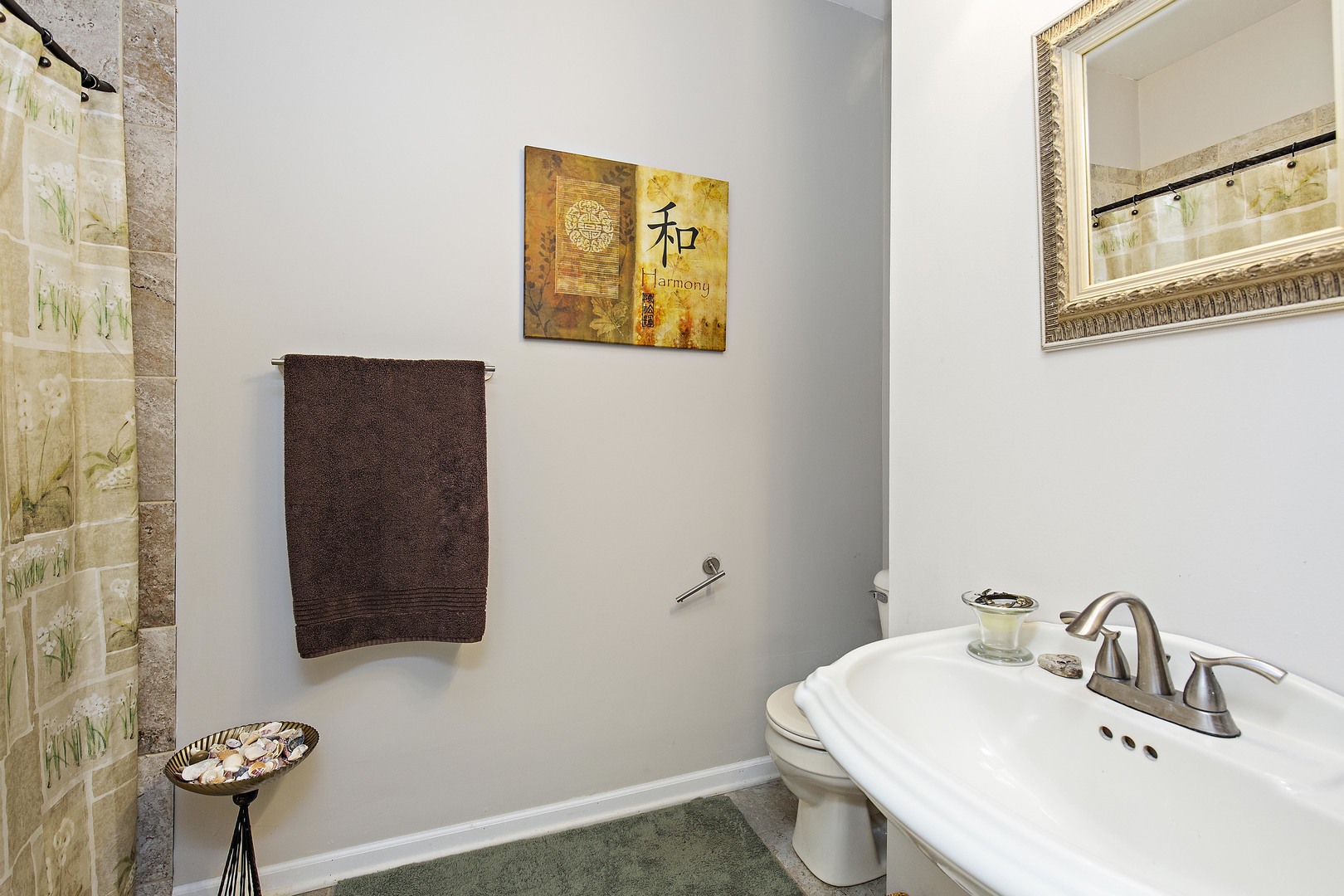 114 Deerpath Road Lake In The Hills, IL 60156 - Photo 10 of 15 a bathroom with a sink and a mirror