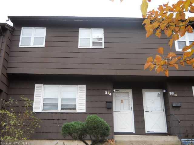 a front view of a house with a garage