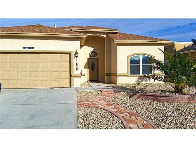 a black and white photo of a living room