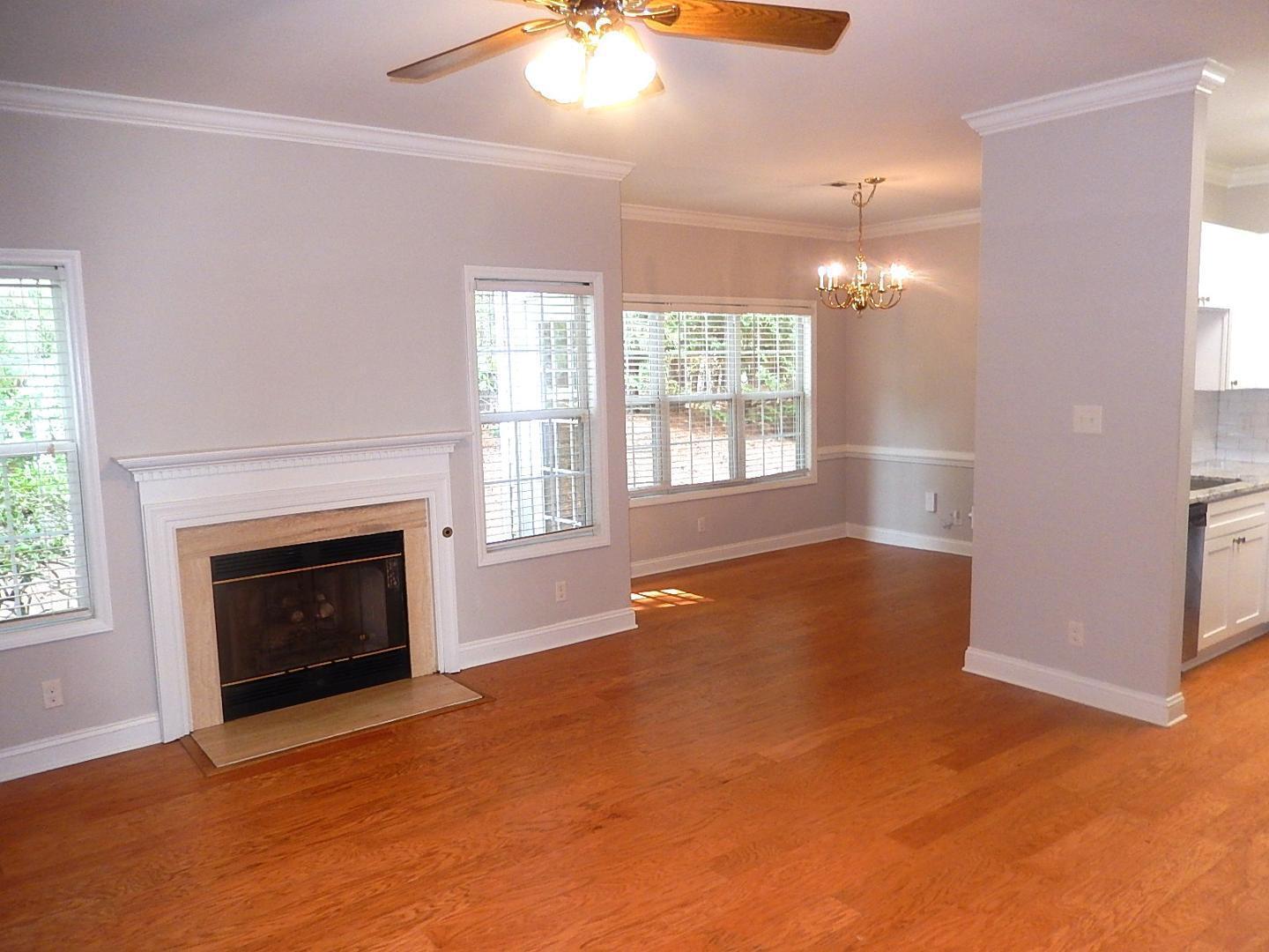 211 Bridgepath Drive Cary, NC 27513 - Photo 6 of 26 a view of an empty room with window and fire place
