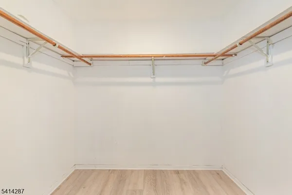 a view of a room with racks on the wall