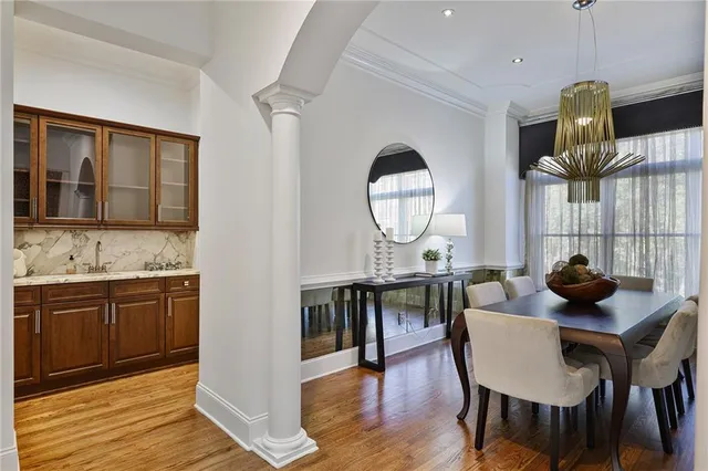 a spacious bathroom with a sink a mirror and a shower
