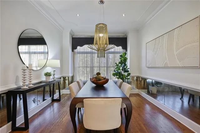 a bathroom with a mirror a sink and a mirror