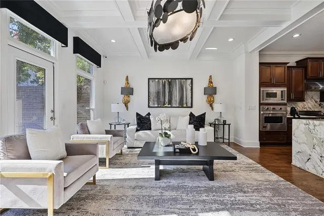 a kitchen with stainless steel appliances granite countertop a stove and a sink