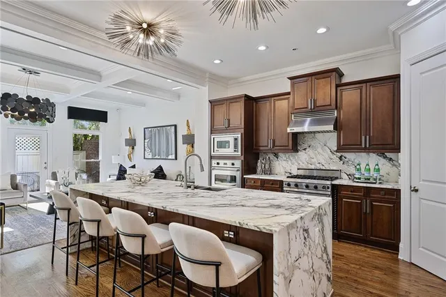 a bathroom with a toilet and a shower curtain