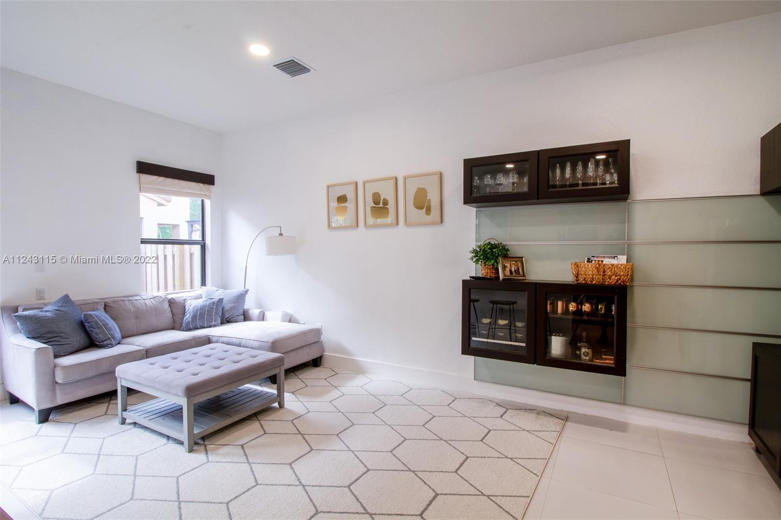 22737 Southwest 89th Path Cutler Bay, FL 33190 - Photo 20 of 27 a living room with furniture