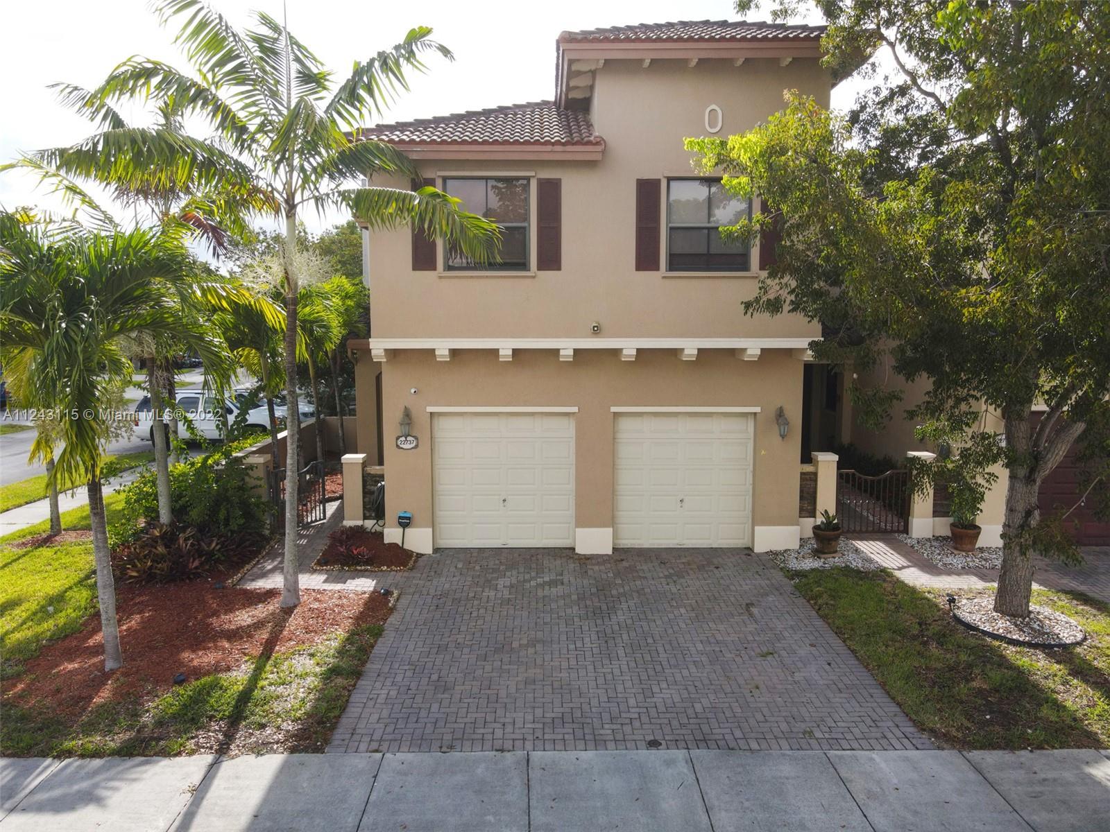 22737 Southwest 89th Path Cutler Bay, FL 33190 - Photo 24 of 27 front view of a house