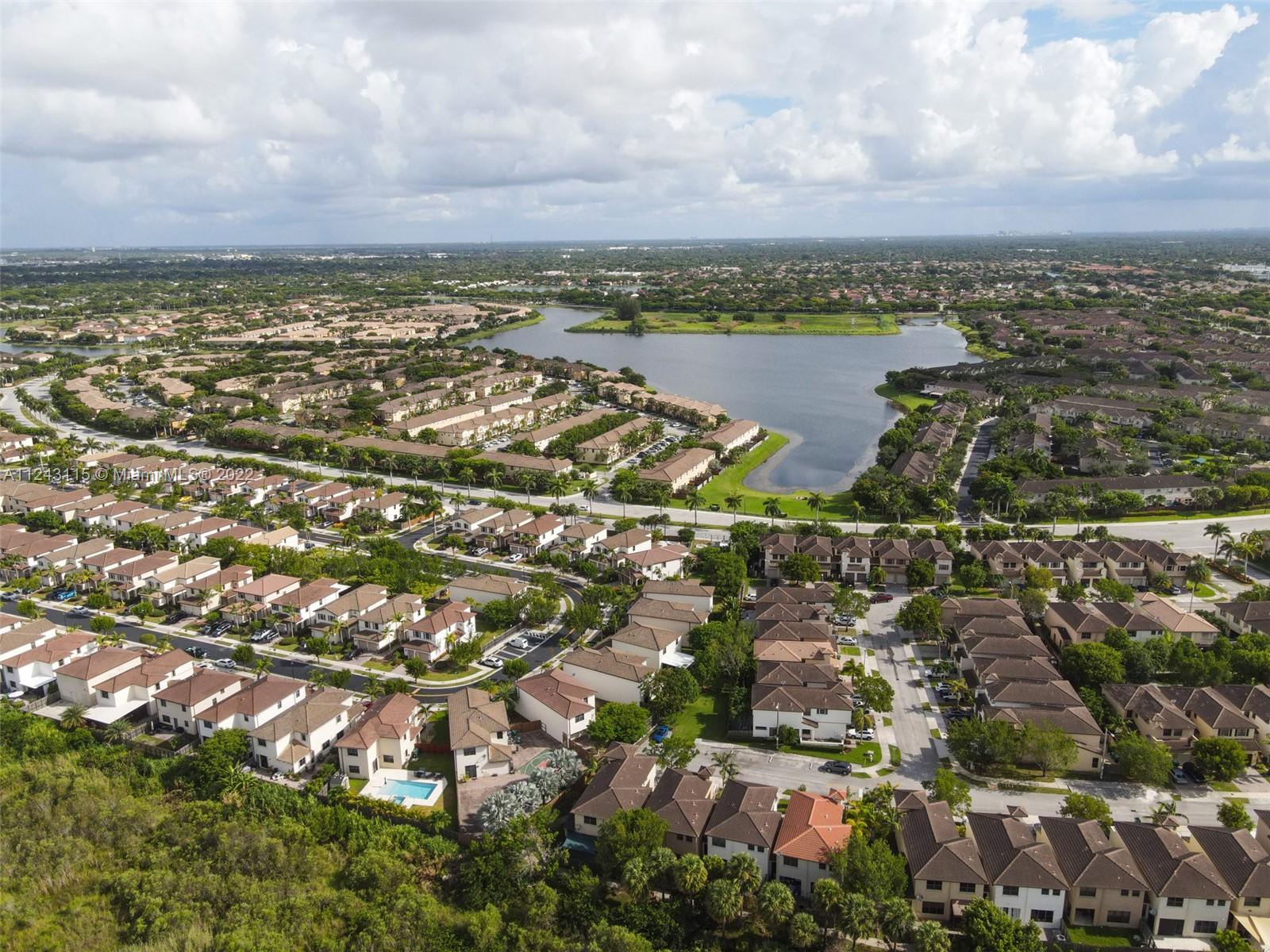 22737 Southwest 89th Path Cutler Bay, FL 33190 - Photo 27 of 27 an aerial view of residential building and lake