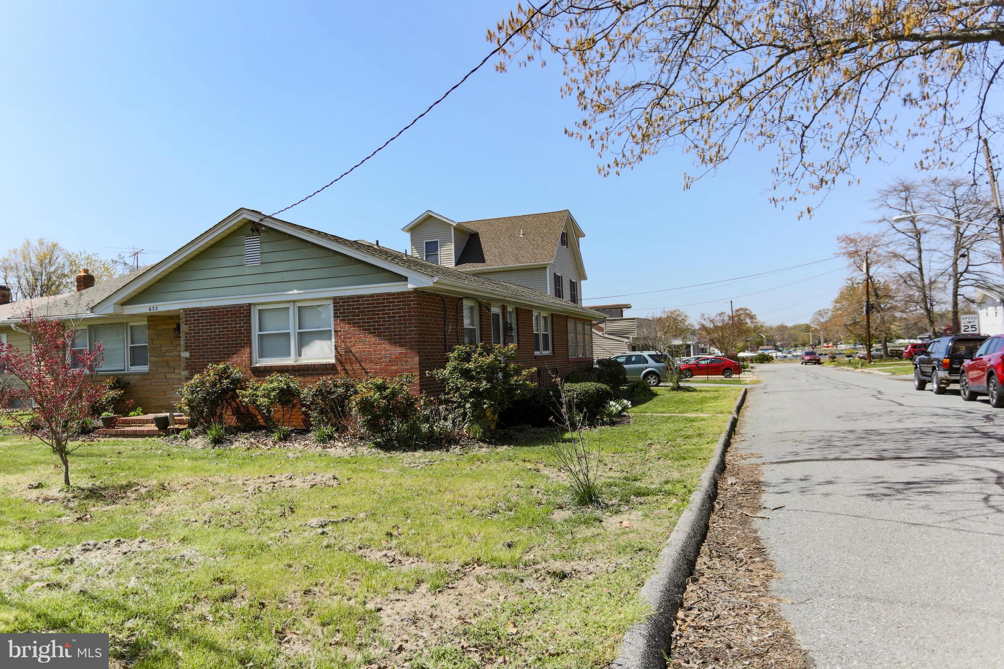 632 Londontown Road Edgewater, MD 21037 - Photo 12 of 28 a front view of a house with a yard