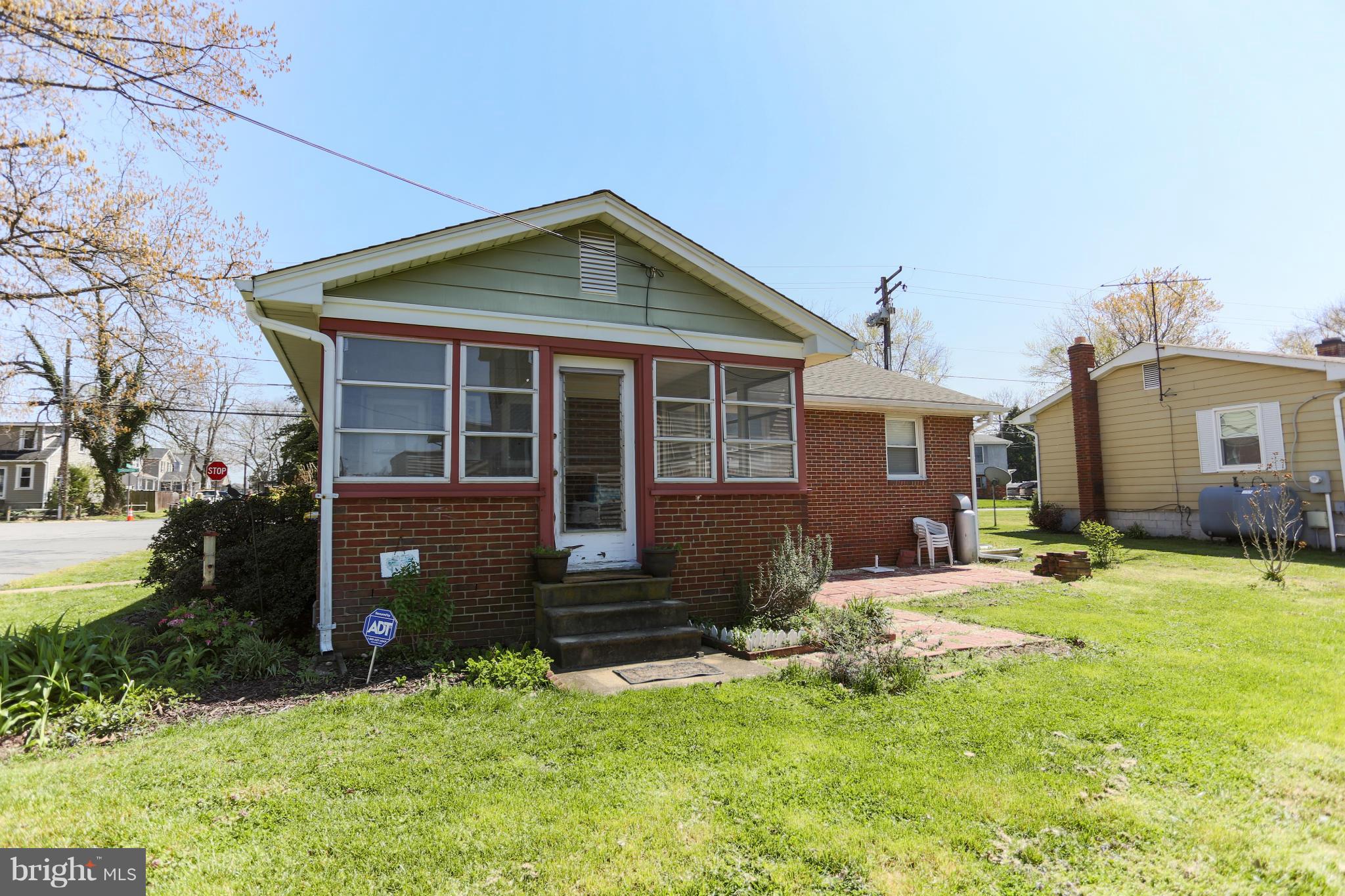 632 Londontown Road Edgewater, MD 21037 - Photo 18 of 28 a front view of a house with a yard and outdoor seating