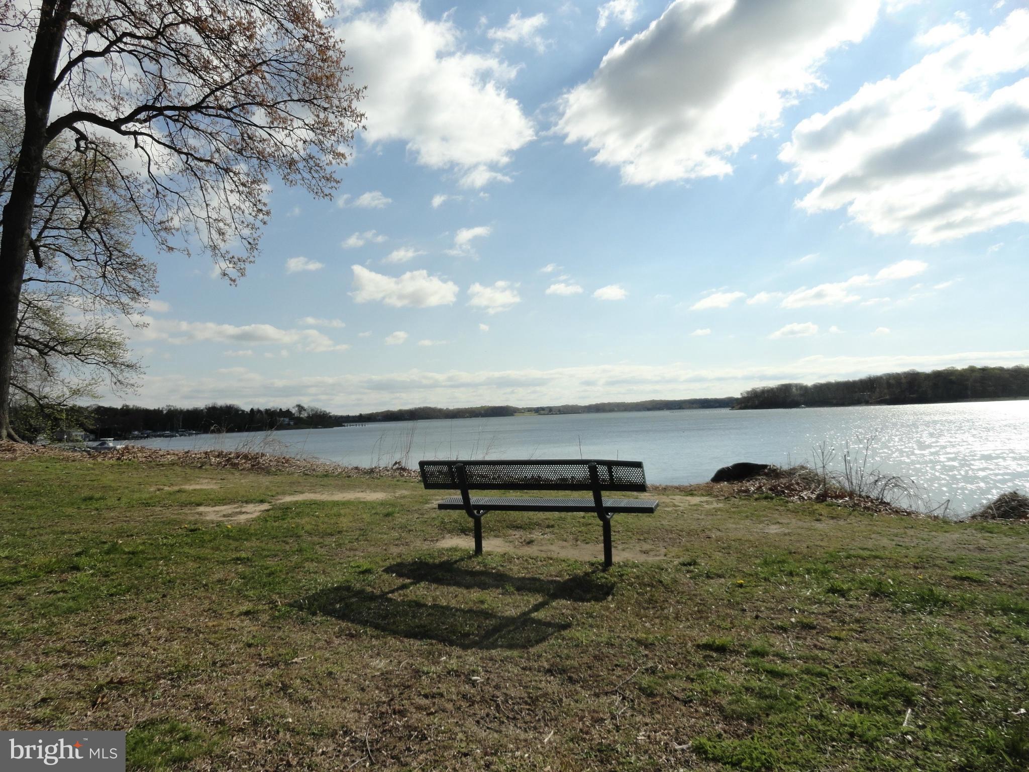 632 Londontown Road Edgewater, MD 21037 - Photo 27 of 28 a view of a lake with outdoor seating