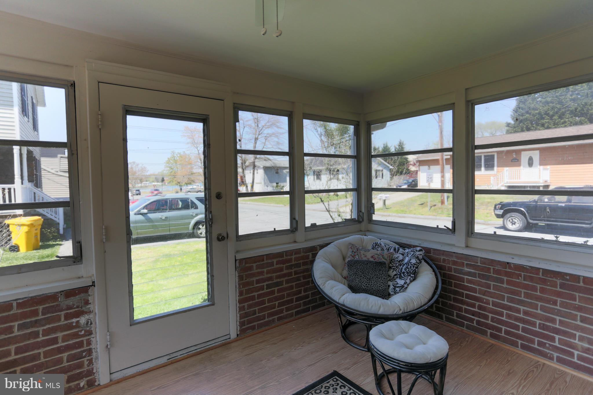 632 Londontown Road Edgewater, MD 21037 - Photo 5 of 28 a room with furniture and a large window