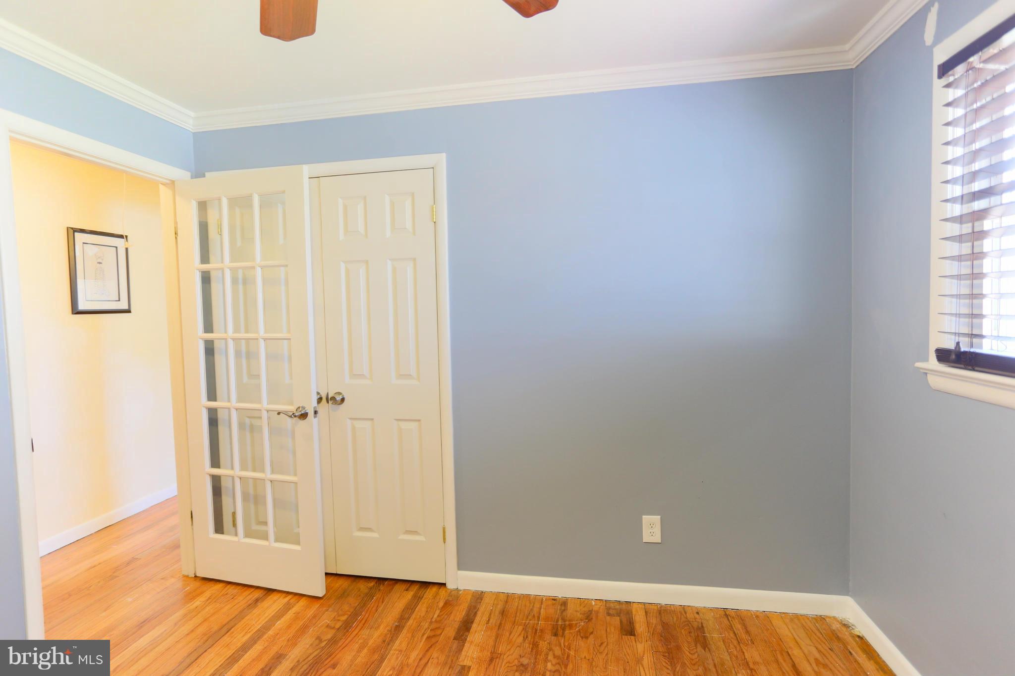 632 Londontown Road Edgewater, MD 21037 - Photo 10 of 28 a view of empty room with wooden floor and fan