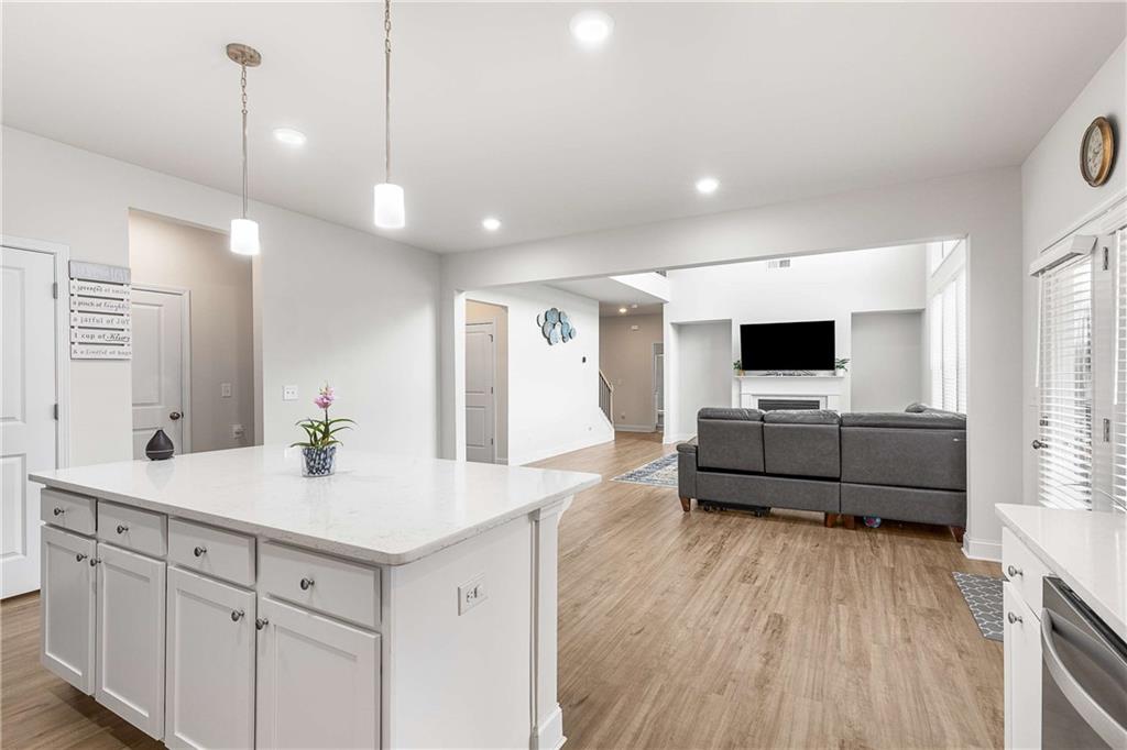 162 Carmichael Drive Canton, GA 30115 - Photo 13 of 57 a living room with furniture and flat screen tv