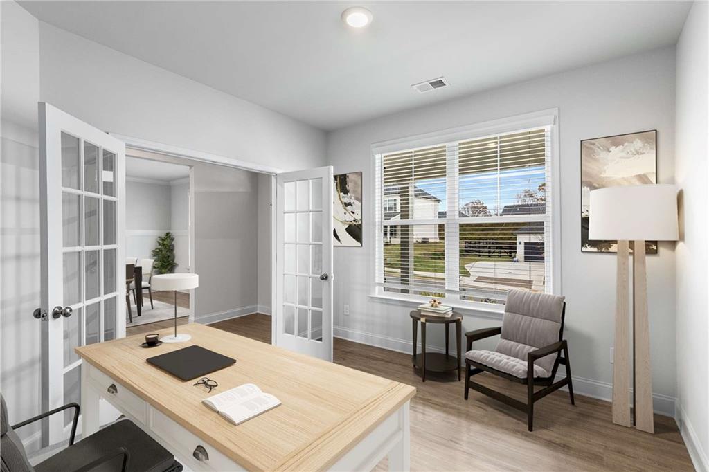 162 Carmichael Drive Canton, GA 30115 - Photo 18 of 57 a living room with furniture and a table