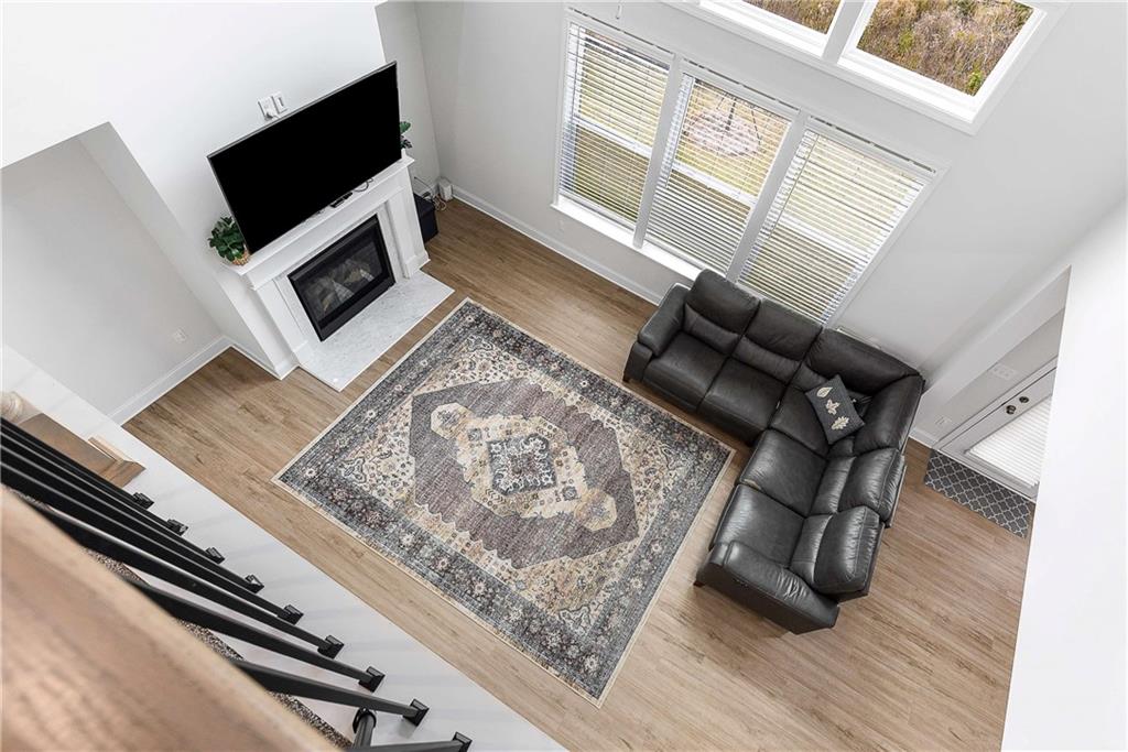 162 Carmichael Drive Canton, GA 30115 - Photo 25 of 57 a living room with furniture and a flat screen tv