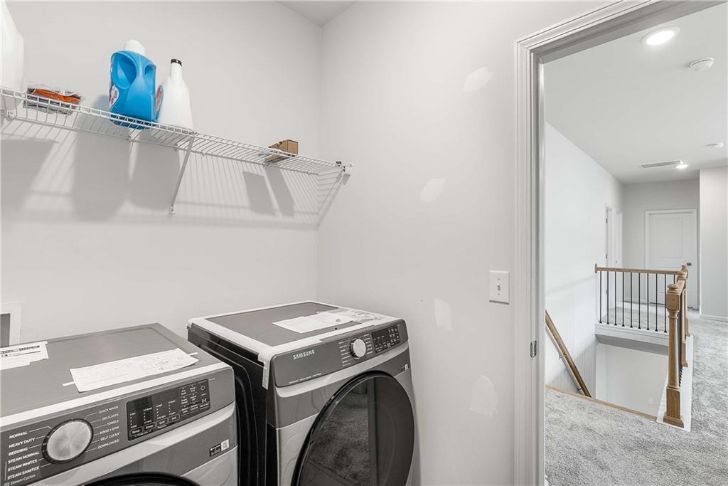 162 Carmichael Drive Canton, GA 30115 - Photo 37 of 57 a utility room with dryer and washer