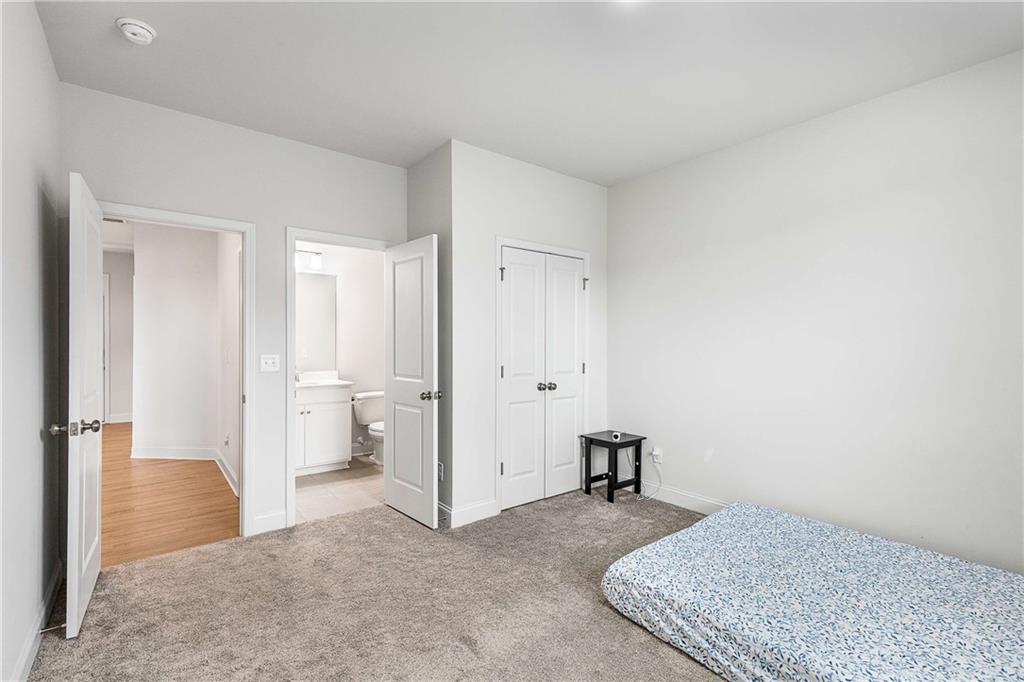 162 Carmichael Drive Canton, GA 30115 - Photo 38 of 57 a view of a room with closet and a bathroom