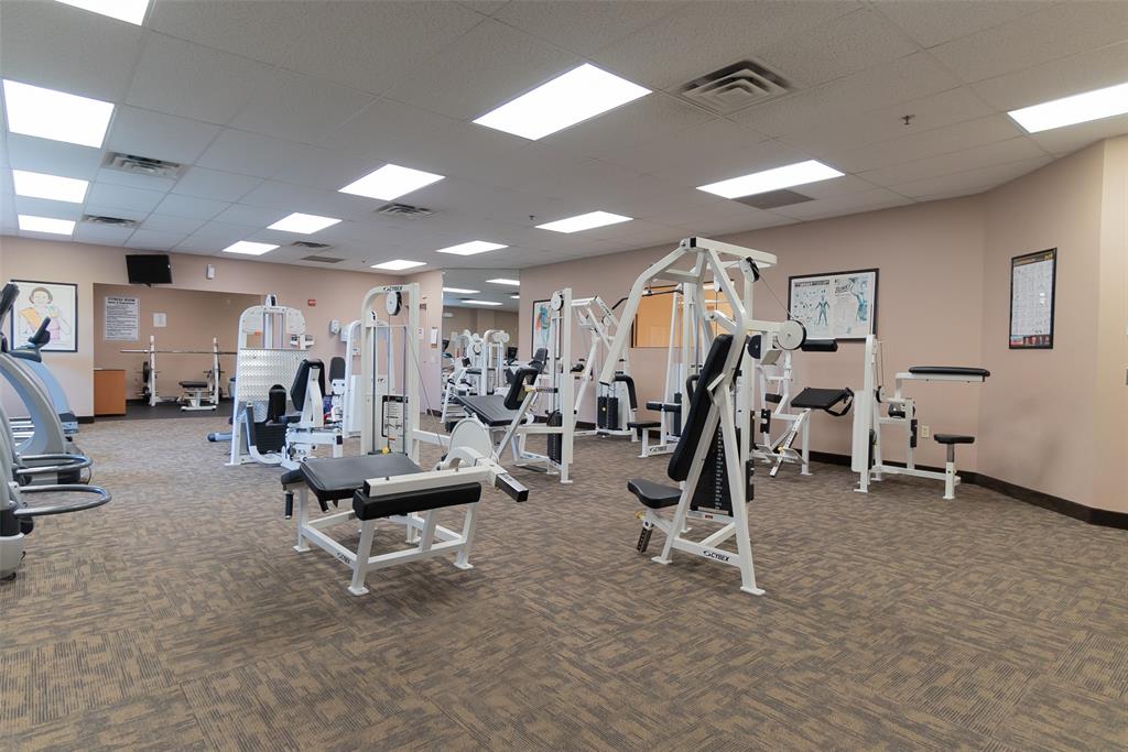 9720 South Hollybrook Lake Drive, Unit 205 Pembroke Pines, FL 33025 - Photo 48 of 57 a view of a room with gym equipment