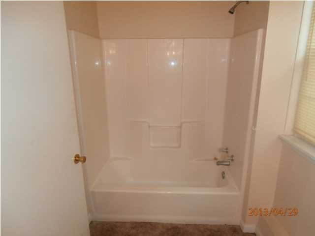 381 Roberts Road East DeFuniak Springs, FL 32433 - Photo 8 of 16 a bathroom with a shower