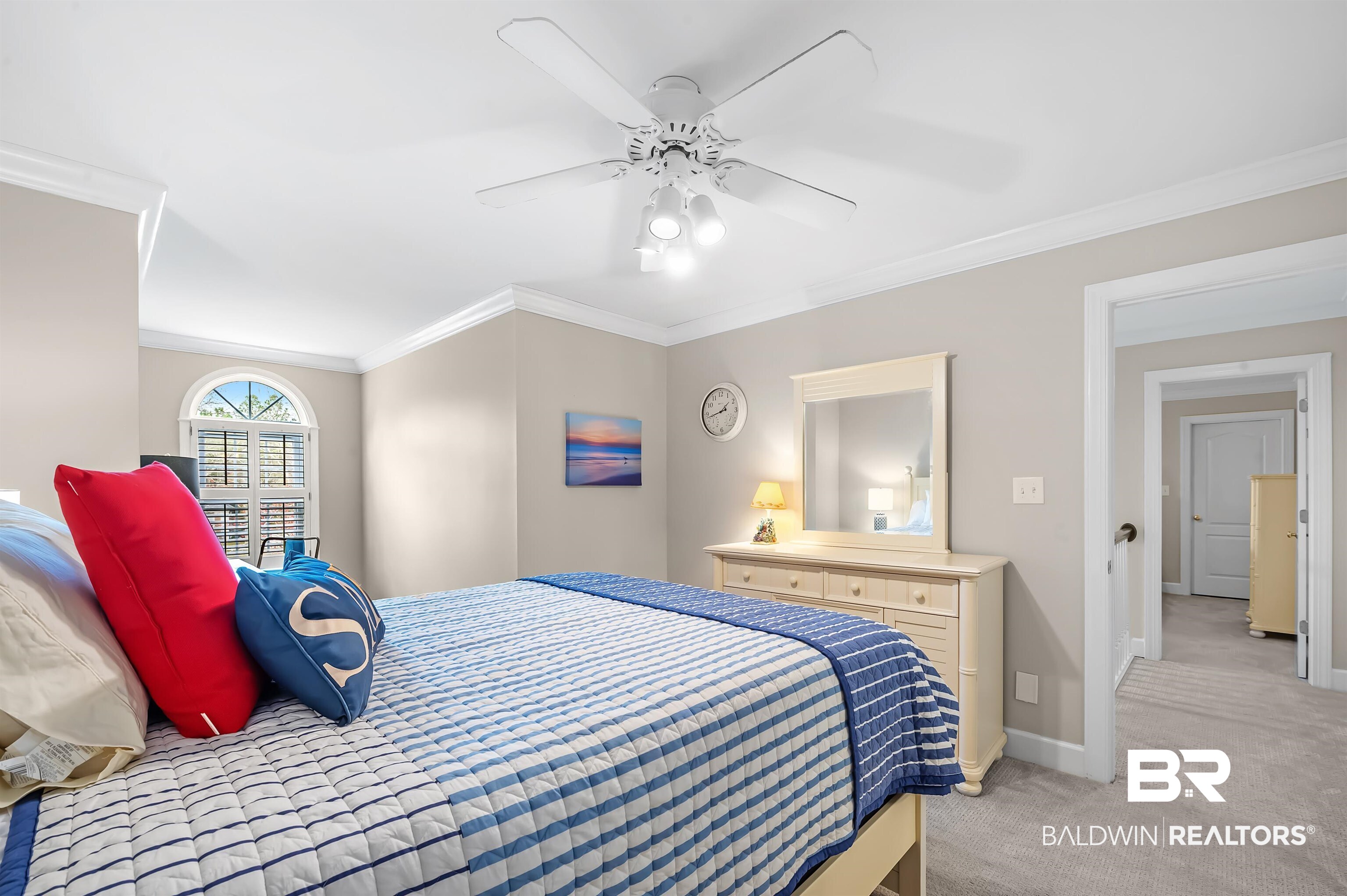 8915 Bay Point Drive Elberta, AL 36530 - Photo 67 of 74 Bedroom with light carpet, crown molding, baseboards, and ceiling fan