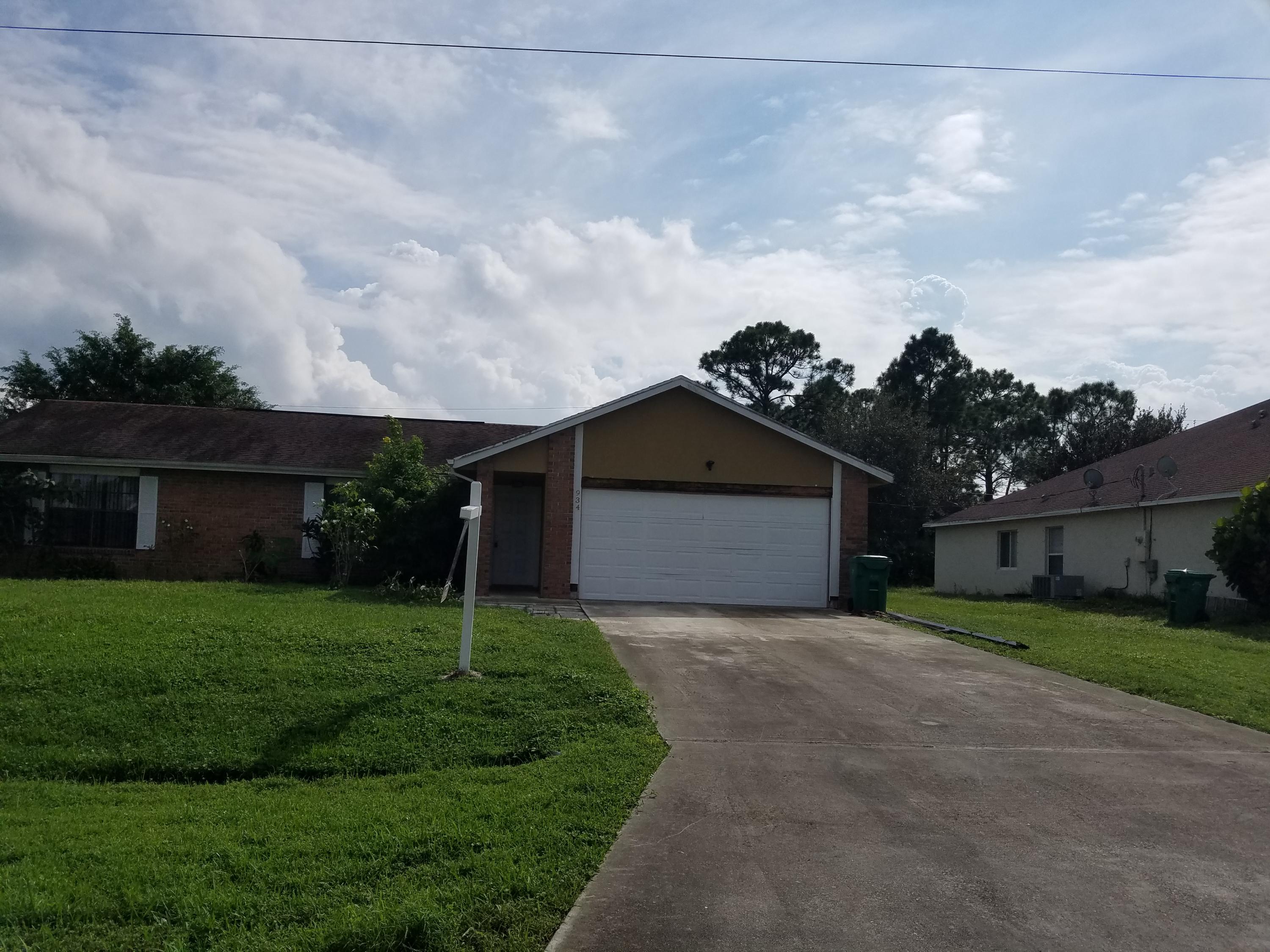 934 Southwest Longfellow Road Port St. Lucie, FL 34953 - Photo 1 of 26 20201112_124414