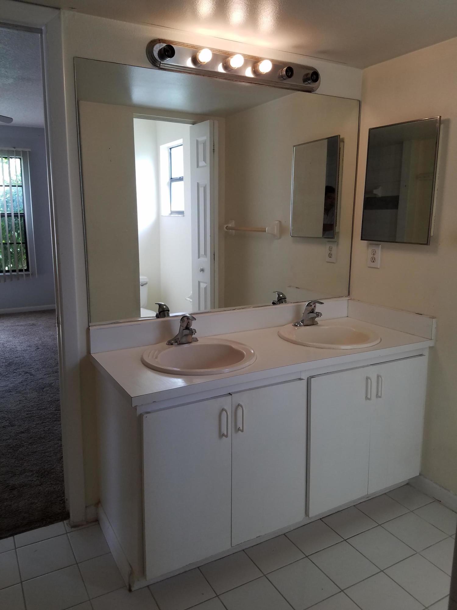 934 Southwest Longfellow Road Port St. Lucie, FL 34953 - Photo 13 of 26 master bath