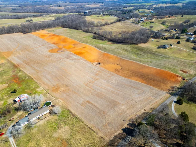 a view of swimming pool with a yard
